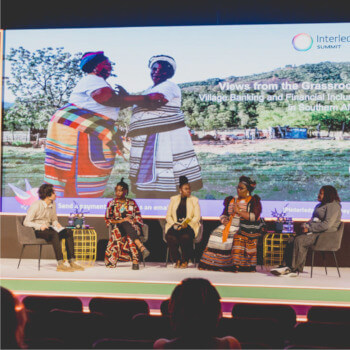 A photograph from the main stage of the 2024 Summit for a session about grassroots financial initiatives